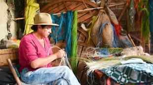 Angelina Sanchez Bustacara, a skilled artisan from Boyacá, Colombia, has been hand weaving baskets for 27 years and is a member of Zuahaza, a women-led artisan cooperative | Photo credit: Zuahaza