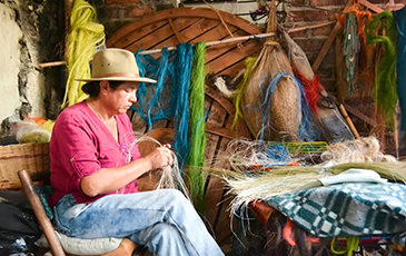 Angelina Sanchez Bustacara, a skilled artisan from Boyacá, Colombia, has been hand weaving baskets for 27 years and is a member of Zuahaza, a women-led artisan cooperative | Photo credit: Zuahaza